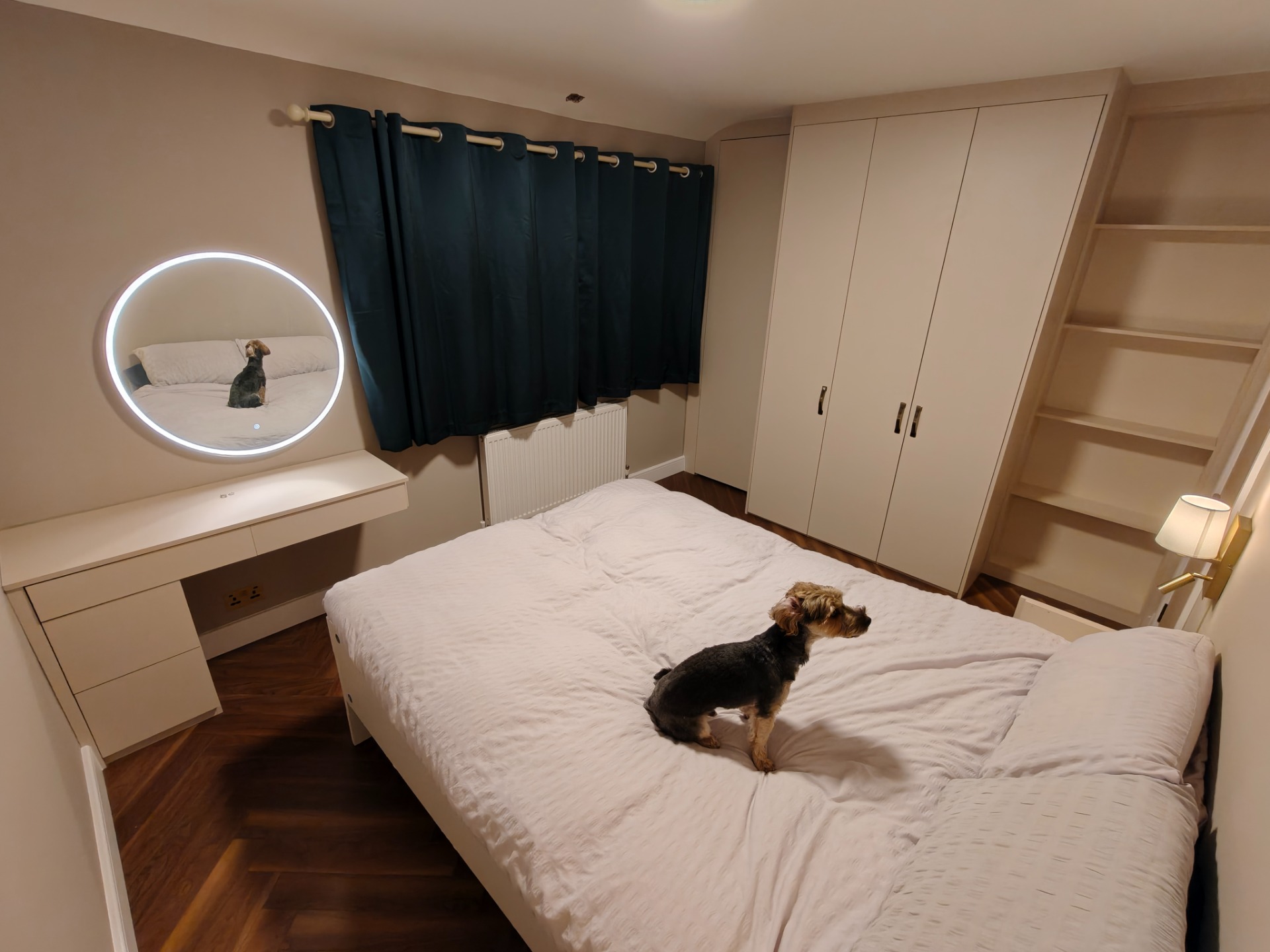 Fitted bedroom with wardrobes and dressing table